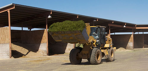 tractor hauling feed
