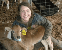 Anna Gibson with Jersey calf