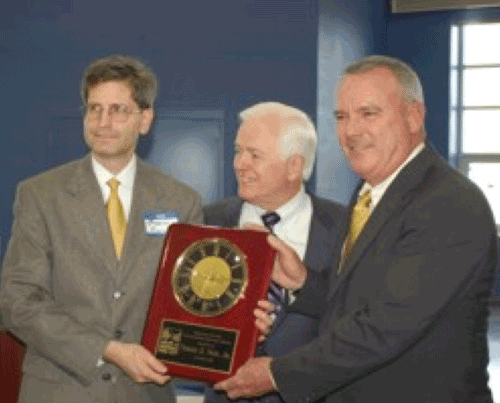 Vegh accepting the Charles Eastin Award