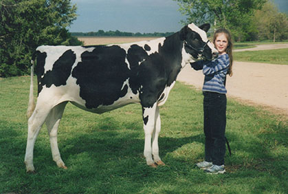 Maggie Seiler with calf