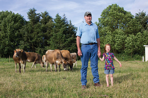 father and daughter on dairy