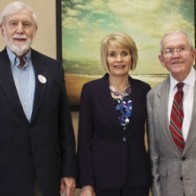  Caption: Dr. Frank B. Hughes, Margaret Elrod and Dr. Seborn Woods