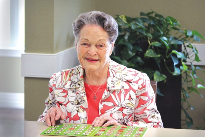 Mary Pease plays bingo at The Oaks