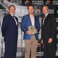  Caption: Jay Covington, 318 Forum's Top Biz recipient Jared Beville of Red River Brewing and Chamber Chairman, Patrick Harrison